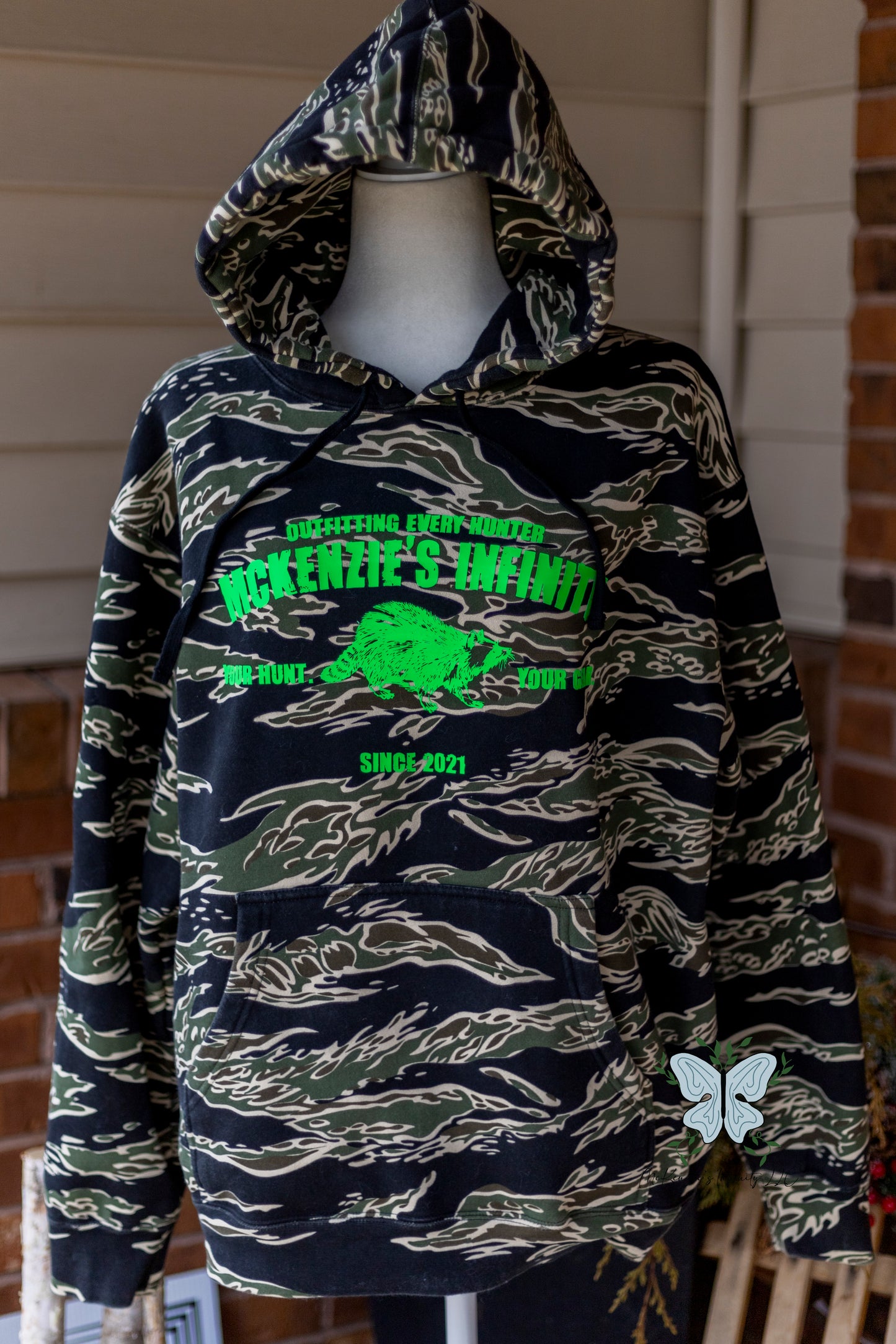 MI Outfitters Since 2021 - Raccoon Edition - Tiger Camo Heavyweight Hooded Sweatshirt ©️
