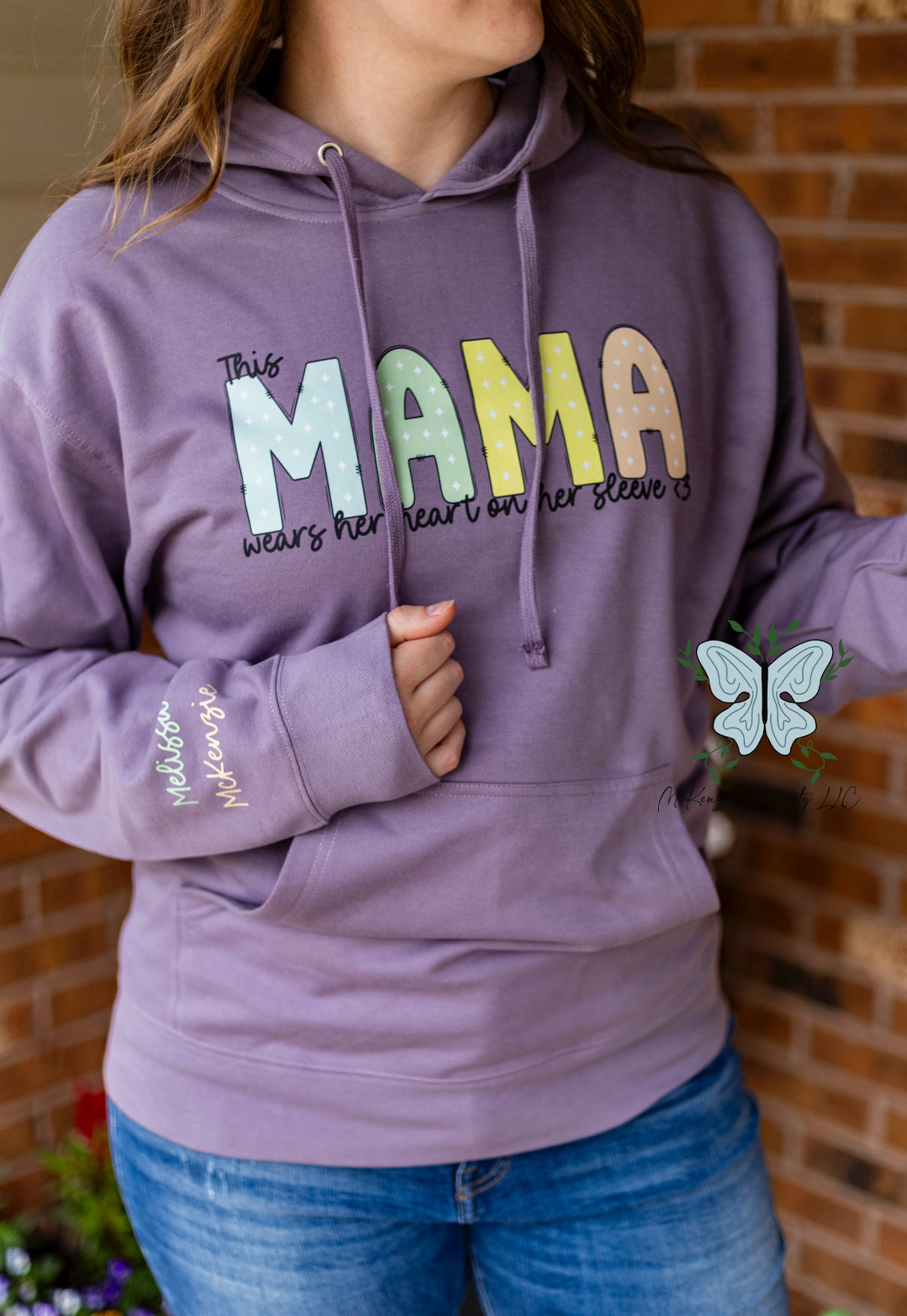 This Mama Wears Her Heart On Her Sleeve - Personalized Sleeve Hooded Sweatshirt