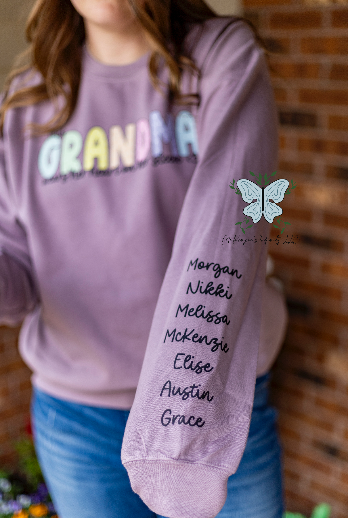 This Grandma Wears Her Heart On Her Sleeve - Personalized Sleeve Crewneck Sweatshirt