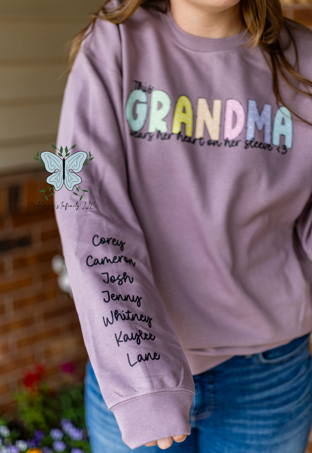 This Grandma Wears Her Heart On Her Sleeve - Personalized Sleeve Crewneck Sweatshirt