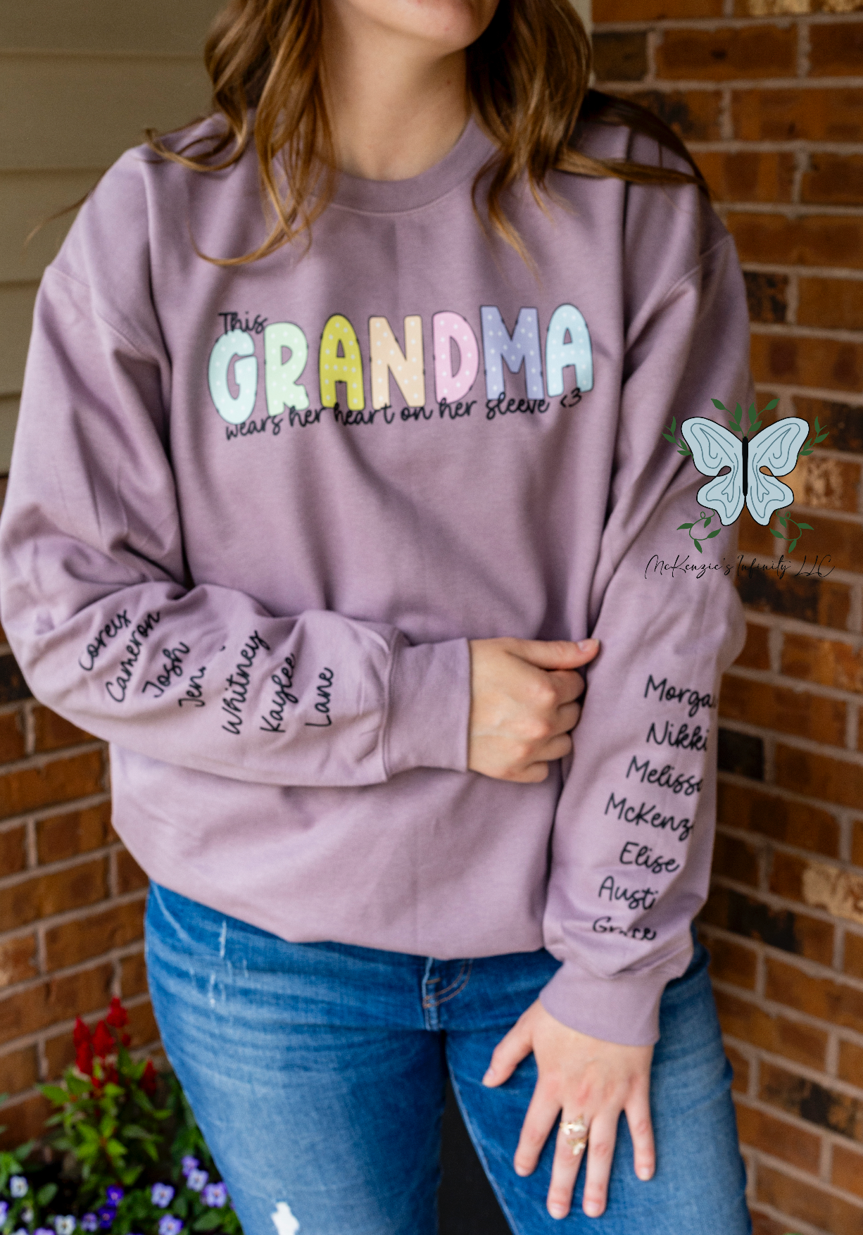 This Grandma Wears Her Heart On Her Sleeve - Personalized Sleeve Crewneck Sweatshirt